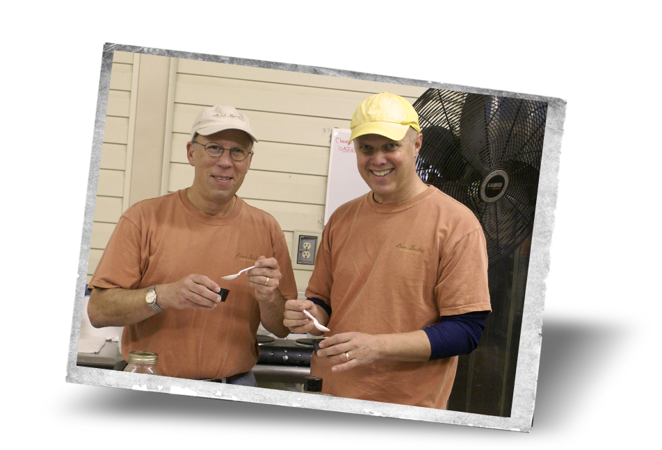Dr. David Heilbronner and Dr. Bruce Wilhelmsen tasting sauce during product development